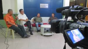 Co -host Rev.  Talha asks Boyet Areno and Ted Aldwin Ong (extreme right)  regarding the stand of the  Iloilo Caucus of Development NGOs (ICODE) on the pork barrel scam